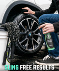 Person applying Ultra Wet Tire Dressing Spray Delivers Extreme Shine With Non Greasy Silicone Formula And UV Protection on car tire