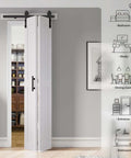 White Bi-Fold Barn Door 56 X 84 Inches With Double Folding Sliding Panels, Solid MDF With Waterproof PVC Surface installed view