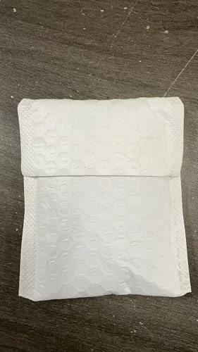 White padded envelope on a dark surface
