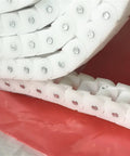 Coiled 3M Wearproof Conveyor Chain 40P RS40P POM, white material view, showcasing durability and high precision engineering.