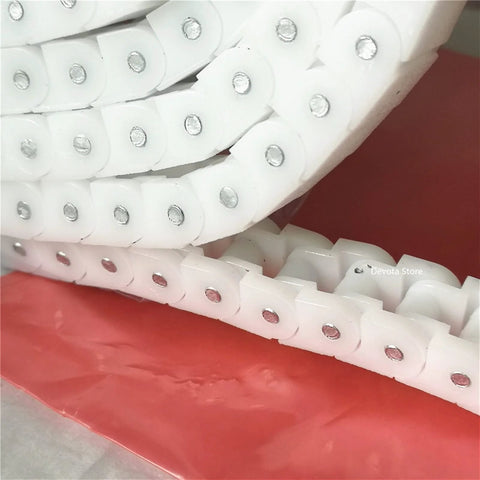 Coiled 3M Wearproof Conveyor Chain 40P RS40P POM, white material view, showcasing durability and high precision engineering.