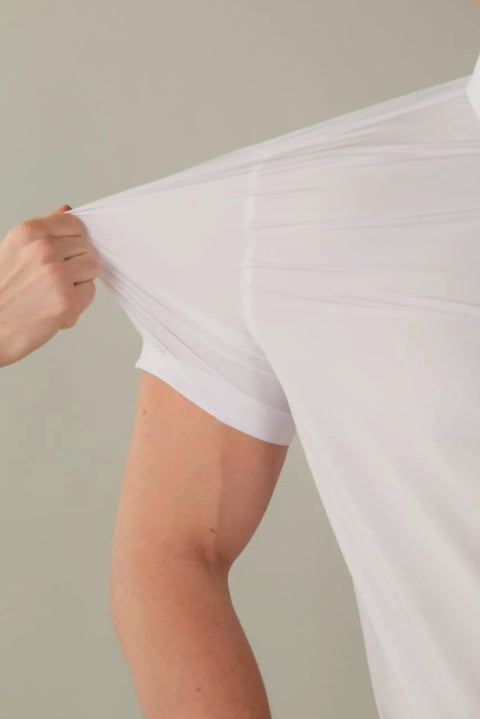 Close-up of 4-way stretch fabric in a Slim Fit Short Sleeve Performance Dress Shirt For Men White 4 Way Stretch Comfort Cloud Like Mobility