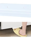 White Cabinet Foot Pull For Trash Can With Touchless Operation shown close-up installed on cabinet with foot pressing down
