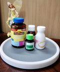 10 Inch Lazy Susan Turntable with bottles, white and gray, suited for kitchen cabinets, refrigerators, pantry organization, cosmetic storage