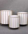 Rust Resistant Iron Plant Pot Stand Set For Indoor And Outdoor Use with white finish and iron frames in various sizes.