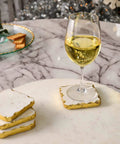 16 inch white marble lazy susan with gold edge, polished stone rotating turntable with coasters and wine glass.
