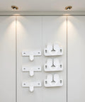Three Pack White Marine Boat Door Catch Sets With Ball Roller Latches and Spring Back Plates mounted on cabinet door.