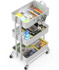 Sturdy 3-Tier Metal Utility Cart On Wheels In White with heavy duty steel frame, visible baskets, and four 2-inch casters filled with items.