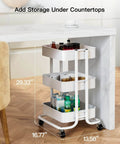 Three Tier Metal Rolling Utility Cart by Pipishell with lockable wheels, white mesh shelves holding bottles under a counter.