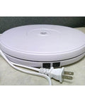 Side view of 24 lbs Load 9.8" inch White Electric Motorized Rotating Turntable Lazy Susan with power cord and switch.