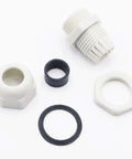 Twelve Pack One Half Inch NPT Cable Glands, Adjustable Six To Twelve Millimeter White Nylon Plastic Waterproof IP68 With Gaskets shown unassembled