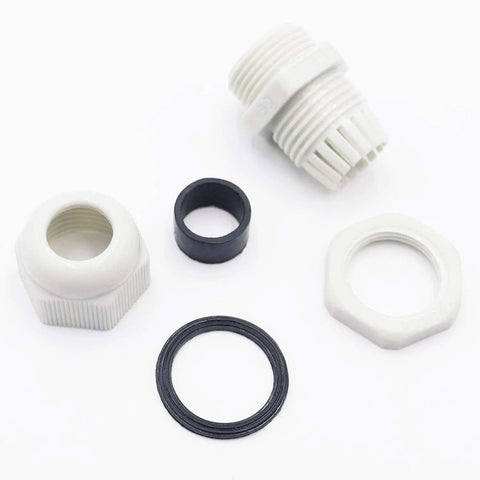 Twelve Pack One Half Inch NPT Cable Glands, Adjustable Six To Twelve Millimeter White Nylon Plastic Waterproof IP68 With Gaskets shown unassembled