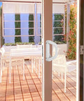 Patio Sliding Door Handle Set With Mortise Lock For 1-1/2 To 2 Inch Thick Doors installed on glass door, white aluminum finish.