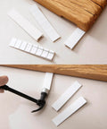 12 Pack White Multi Purpose Furniture Plastic Shims For Leveling And Stabilizing Heavy Objects under wood slab