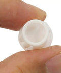 Close-up view of a single piece from the All Purpose White Hole Plugs Set Of 30 Pieces 10mm Flush Type Panel Plastic End Caps Easy Install