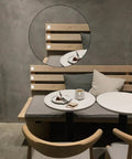 Super Handy 155 Piece White Plastic Hole Plugs Set In 6 Sizes installed on wooden furniture near a dining table.