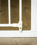 Close-up of latch on Extra Wide Baby Gate For Doorways And Bottom Of Stairs Adjustable From 29 To 38 Inches 30 Inches Tall With 6 Inch Extension Pressure Mounted Safety Gate For Babies Toddlers And Pets American Designed And Owned White