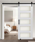 32 By 84 Inch Sliding Barn Door With Header Board And 6 Ft Hardware Track Kit And Handle, Waterproof PVC Surface, Pre Drilled Holes For Easy Assembly, MDF Construction, Smooth And Quiet Sliding installed in a modern bedroom.
