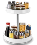 Two Tier Lazy Susan Turntable Spice Rack with adjustable height and rotating organizer, 12in white, holding various spices and condiments.