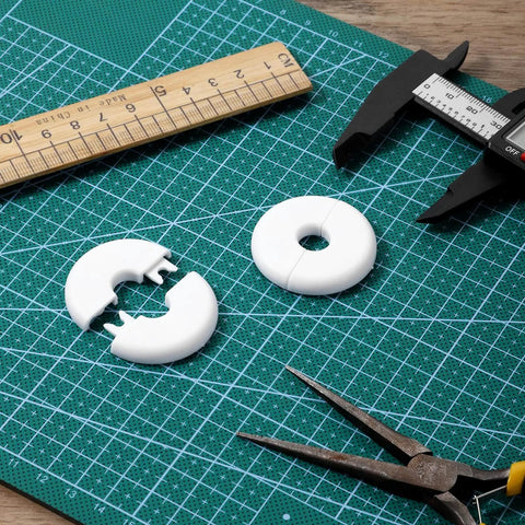 2 Pack Wall Grommets For Cables Pass Through Anti Slip Hole Covers For Walls And Furniture White on cutting mat with tools