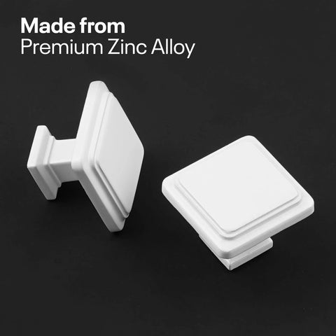 Two white cabinet knobs from the 10 Pack Zinc Alloy Drawer Knobs, square design for kitchen cabinets and drawers, on black background.