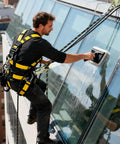 Worker on building facade using Pro Grade 50Ft Vertical Lifeline Kit For Fall Protection With Rope Grab Heavy Duty Safety Rope