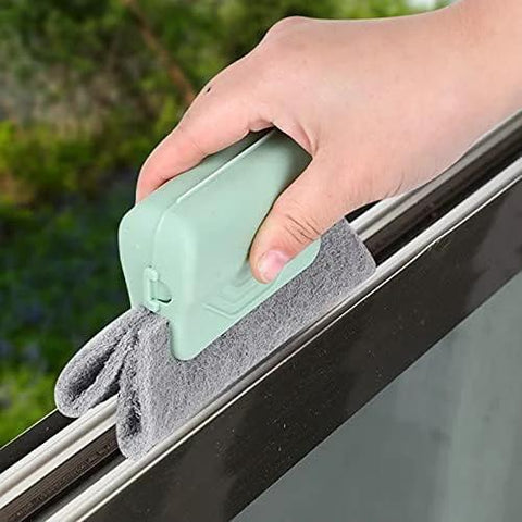 Hand using Window Groove Cleaning Brush Set with Magic Track Cleaner Mini Brush and Replaceable Cloths for cleaning window track.