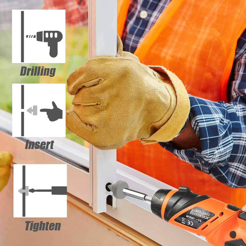 Person in gloves using an orange drill to tighten screws on a metal door frame with instructional graphics for drilling, inserting, and tightening.