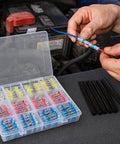 Person using Super Handy 300 Piece Wire Ferrule Kit With Insulated Cord Pin End Terminals And Crimp Connectors for wiring repair