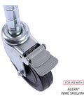 Close-up of a gray caster with brake mechanism for Alera wire shelving. Premium Wire Shelving Casters Set Of Four With 600 Pound Per Caster Capacity Gray Finish Perfect For Upgrading Storage Racks To Mobile Flexible Organization In Warehouses Garages And Workshops.