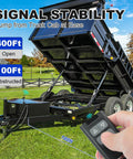 Wireless Dump Trailer Remote Control Kit With 100 Ft Range, Dual Remotes, image of remote operating dump trailer lift outdoors
