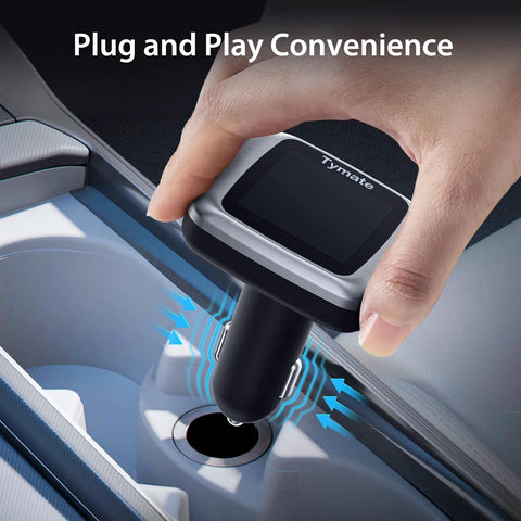 Hand plugging TM7 Wireless Tire Pressure Monitoring System into car charging port