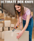 Woman using four pack retractable utility knife with 18mm snap off blades and a secure lockable mechanism to cut cardboard boxes.