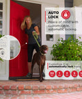 Woman with a dog leaving a house showing Powerbolt 250 10 Button Keypad Electronic Deadbolt With Auto Lock And Keyless Entry for Satin Nickel Exterior Doors.