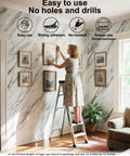 Woman using heavy duty double sided mounting tape waterproof foam tape heat resistant adhesive for picture hanging indoors on marble wall