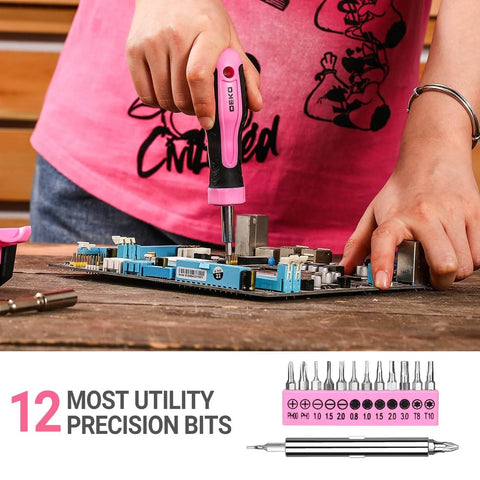 Woman using Pink Tool Kit For Women 42 Piece Home DIY Set For Repairs And Woodworking Projects on circuit board with precision bits