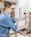 Woman using lightweight 8oz hammer set with a small claw hammer and 25 mm rubber mallet in pink for home repairs