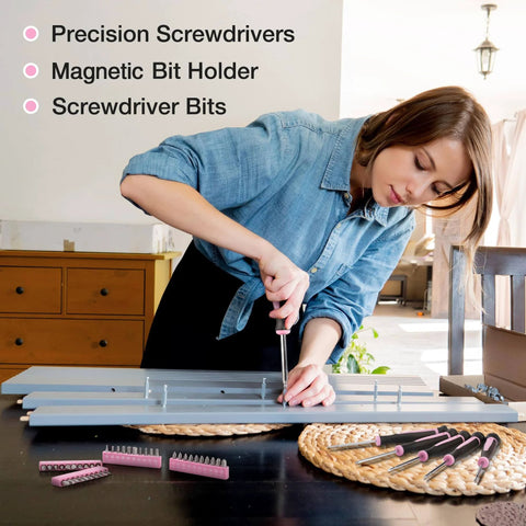 Woman using tools from the Pink 263-Piece Home Repair Tool Kit With Wide Mouth Storage Bag For DIY Projects And Breast Cancer Awareness Ribbon