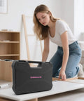 Woman assembling furniture with Pink 69 Piece Tool Kit For Women Portable Hand Tools Set for DIY projects in living room