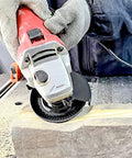Person using angle grinder with 4 Inch Wood Carving Disc for Angle Grinders With Five Eighths Inch Arbor Curved Wood Shaping Wheel