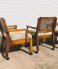 Wooden chairs with cushioned seats using Two Inch Ball Caster Wheels Set Of Four With Five Sixteenth By One And One Half Inch Metal Sockets Antique Gold Finish Polyurethane Wheels For Quiet Rolling Replacement For Sofa Chair And Cabinet Furniture DIY Repair on concrete surface