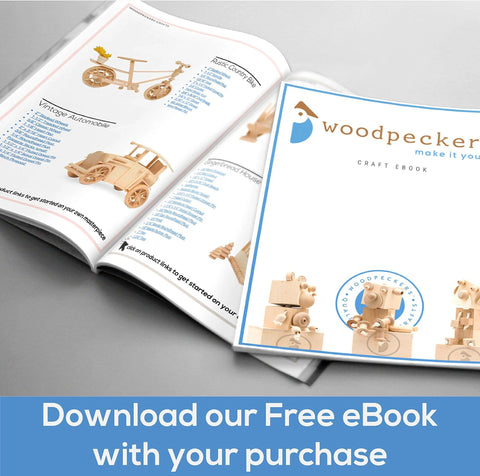 Open craft eBook titled 'Woodpecker' with wooden toy illustrations, featuring a free download offer.
