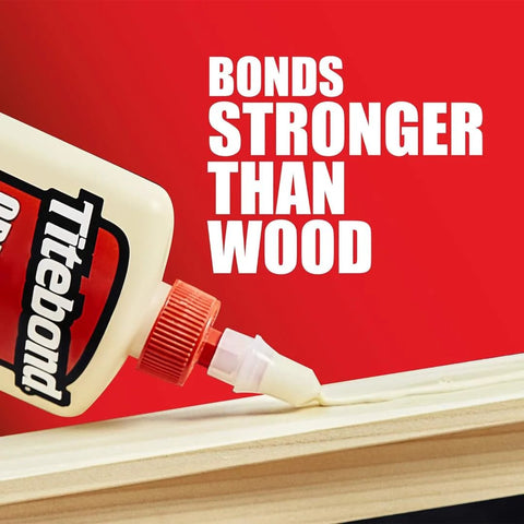 Wood Glue 5063 for Woodworking and Furniture Repair, fast set, non-toxic, 8 oz bottle applying glue on wood surface.