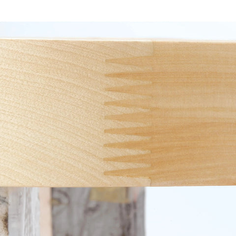 Close-up of wood joint on 32 Inch Kidney Shaped Wood Lazy Susan With 360 Degree Swivel Bearings For In Cabinet Kitchen Organization.