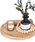 Wood lazy susan organizer kitchen turntable, 10 inch round decorative farmhouse tray in brown with candle and vase.