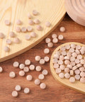 Flat Head Wood Plugs Set, 100 Pcs Three Eighths Inch Screw Hole Plugs displayed on a wooden surface