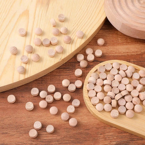 Flat Head Wood Plugs Set, 100 Pcs Three Eighths Inch Screw Hole Plugs displayed on a wooden surface