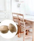 50 Piece Wooden Button Top Screw Hole Plugs For Furniture And Home in a dining room setting with wooden chairs and table.