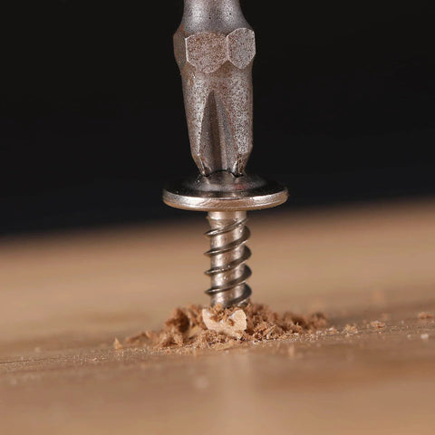 Close-up of a 8x1 Inch Wood Screw being driven into wood, showcasing self-tapping truss head. Ideal for woodworking with 410 stainless steel.