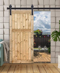 6.6 Ft Sliding Barn Door Hardware Kit For 40 Inch Wide Door Panel With I Shape Hangers Black Finish installed in living room